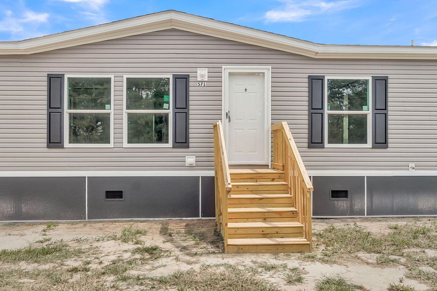 Exterior details and patio area of a home in , Dorchester (Image 32).