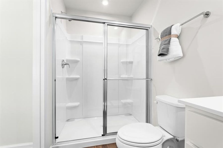 Representative furnished interior of a home built from the Ellis by Ryan Homes in Middle Creek Village Coastal Cottages & Villas, Bolivia (Image 20).