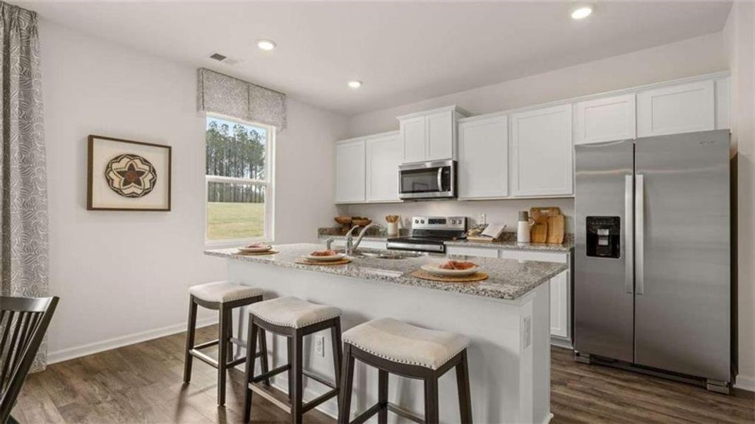 Furnished interior view inside a new home in Oakchase at Hampton, Hampton (Image 9).