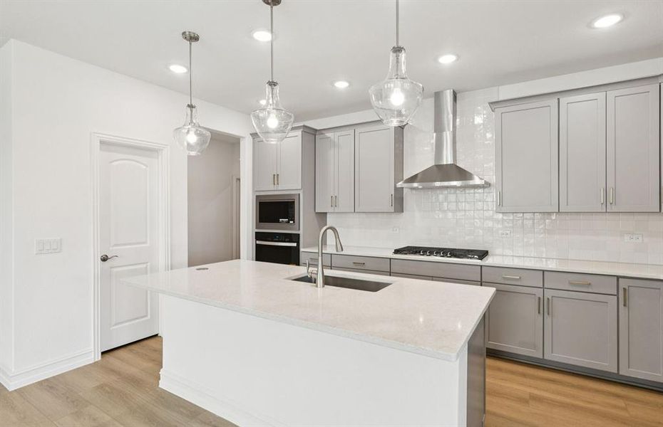Spacious kitchen with eat-in bar top island Spacious kitchen with eat-in bar top island