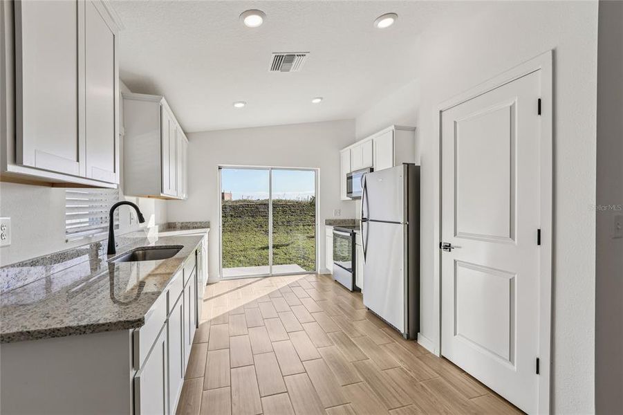 Furnished interior view inside a new home in Trilby Crossing, Brooksville (Image 3). Furnished interior view inside a new home in Trilby Crossing, Brooksville (Image 3).