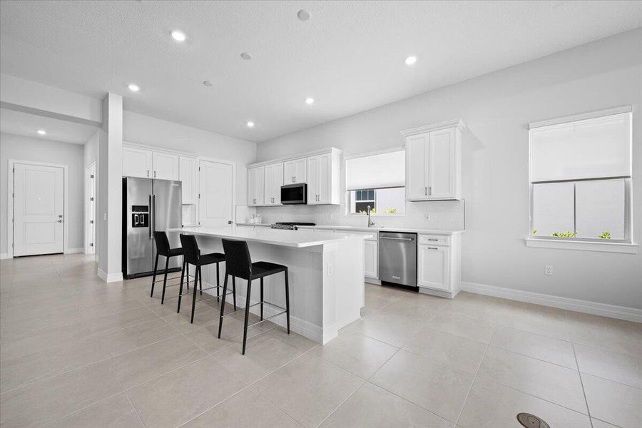 Furnished interior view inside a new home in Avondale at Avenir, Palm Beach Gardens (Image 14).