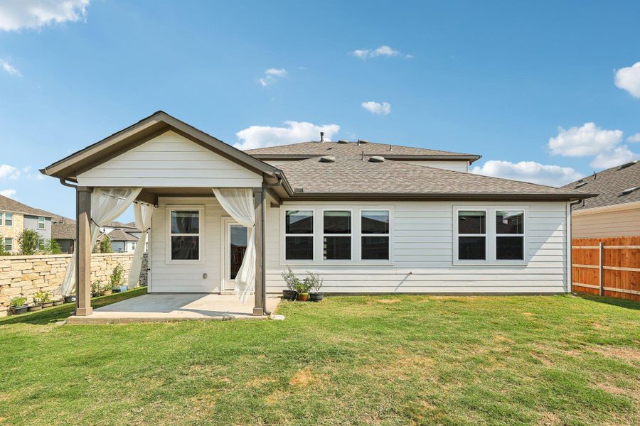 Front exterior of a new home in Emory Crossing 50s, Hutto, TX, highlighting curb appeal (Image 17). Front exterior of a new home in Emory Crossing 50s, Hutto, TX, highlighting curb appeal (Image 17).