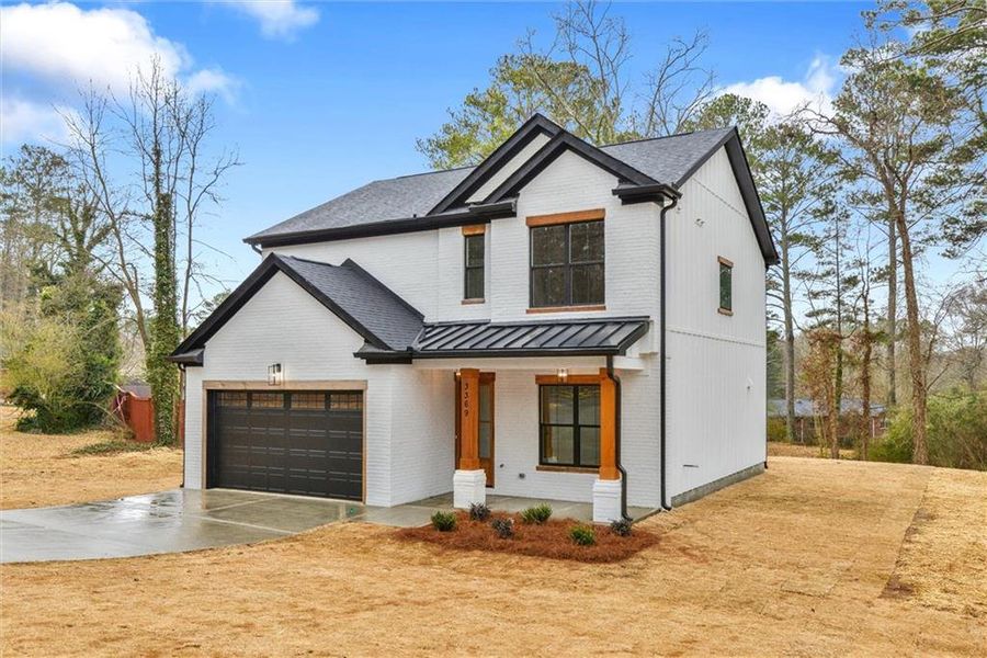 Front exterior of a new home in , Atlanta, GA, highlighting curb appeal (Image 21).