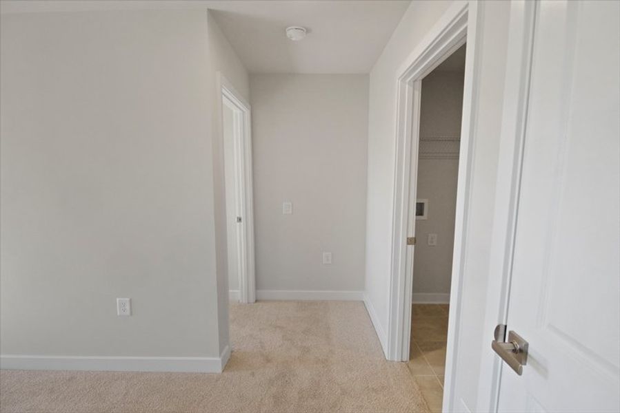 Spacious, unfurnished interior of a new home in Reidville Town Center Cottages, Duncan (Image 20).