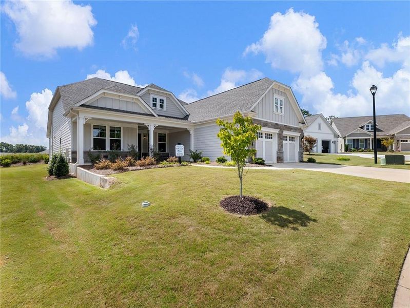 Front exterior of a new home in , Hoschton, GA, highlighting curb appeal (Image 22). Front exterior of a new home in , Hoschton, GA, highlighting curb appeal (Image 22).