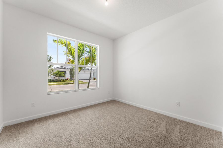 Spacious, unfurnished interior of a new home in Tradition - Telaro, Port St. Lucie (Image 10).