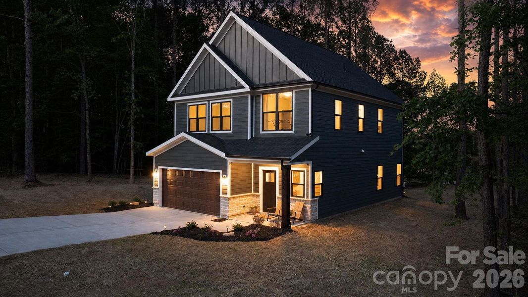 Front exterior of a new home in , Hickory, NC, highlighting curb appeal (Image 27).