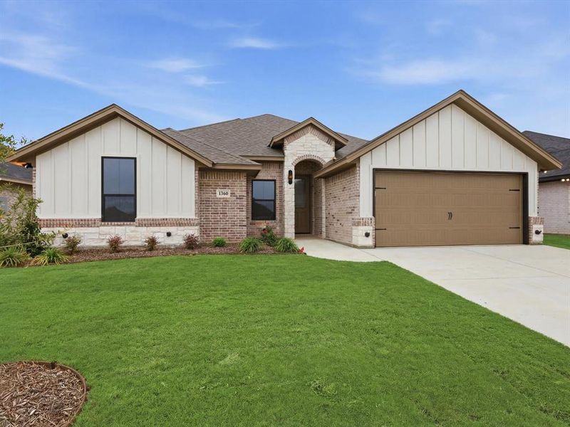 Front exterior of a new home in , Tolar, TX, highlighting curb appeal (Image 18).