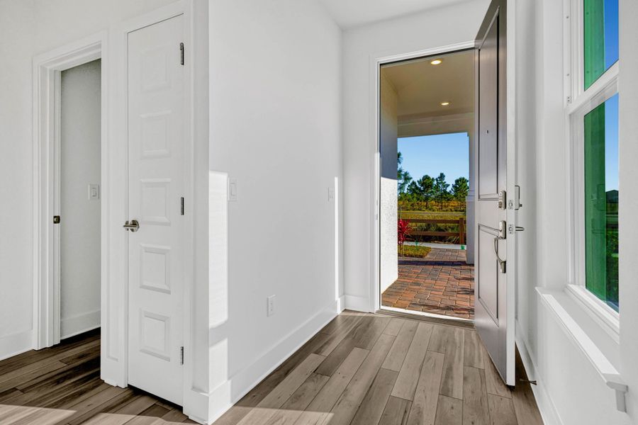 Representative unfurnished interior of a home built from the Whitney by Rockwell Homes in Harvest at Ovation - Townhomes, Winter Garden (Image 14). Representative unfurnished interior of a home built from the Whitney by Rockwell Homes in Harvest at Ovation - Townhomes, Winter Garden (Image 14).