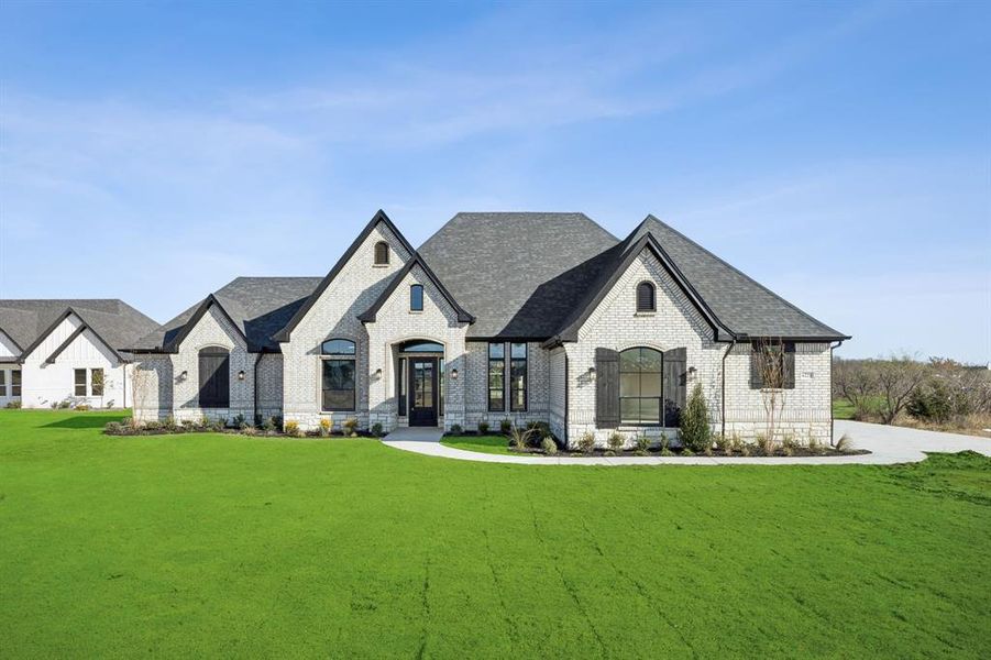 Front exterior of a new home in , Royse City, TX, highlighting curb appeal (Image 1). Front exterior of a new home in , Royse City, TX, highlighting curb appeal (Image 1).