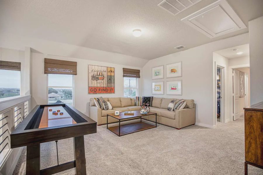 Representative furnished interior of a home built from the Pegasus by Chesmar Homes in Santa Rita Ranch, Liberty Hill (Image 10).