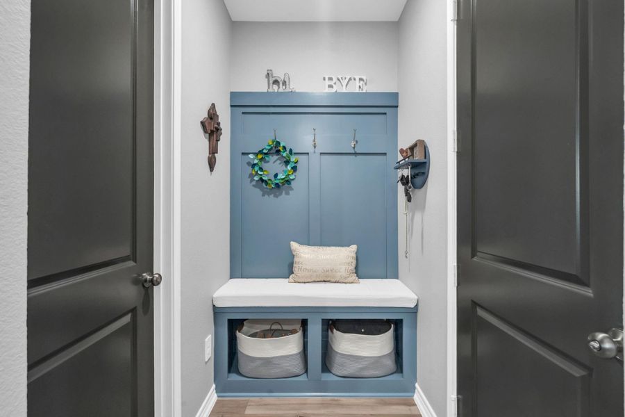 A very useful and attractive custom coat/shoe area. A very useful and attractive custom coat/shoe area.