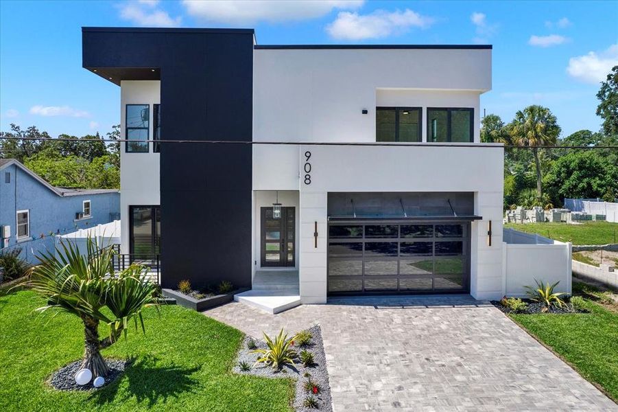 Front exterior of a new home in , Tampa, FL, highlighting curb appeal (Image 18).