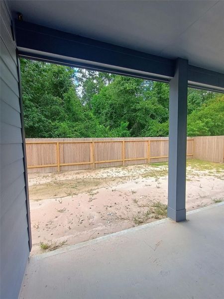 Exterior details and patio area of a home in Splendora Fields, Patton Village (Image 3).