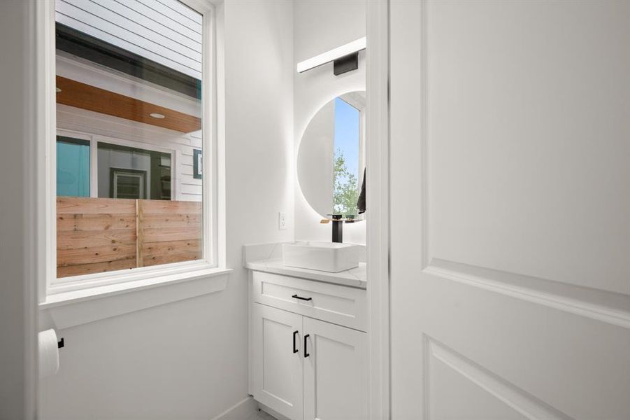 Half Bathroom featuring vanity