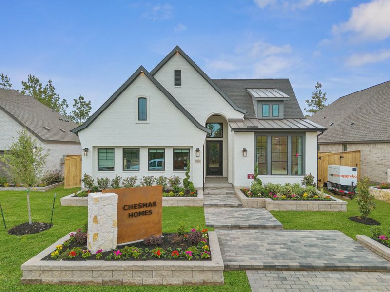Representative exterior photo of a completed home built from the Hampton by Chesmar Homes in Grange, Katy, TX (Image 21). Representative exterior photo of a completed home built from the Hampton by Chesmar Homes in Grange, Katy, TX (Image 21).