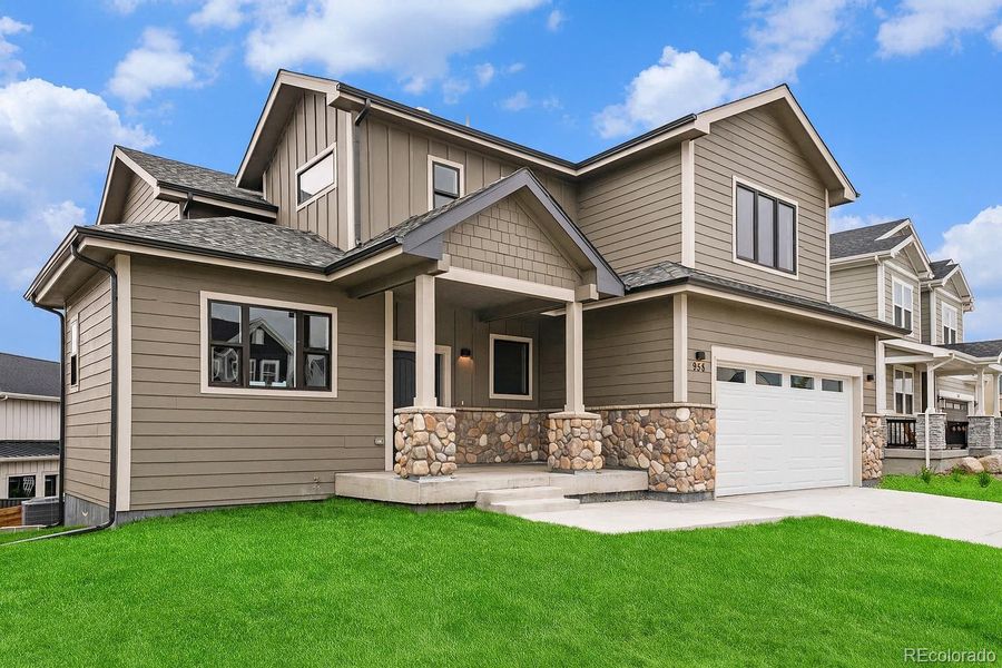Front exterior of a new home in , Louisville, CO, highlighting curb appeal (Image 2).