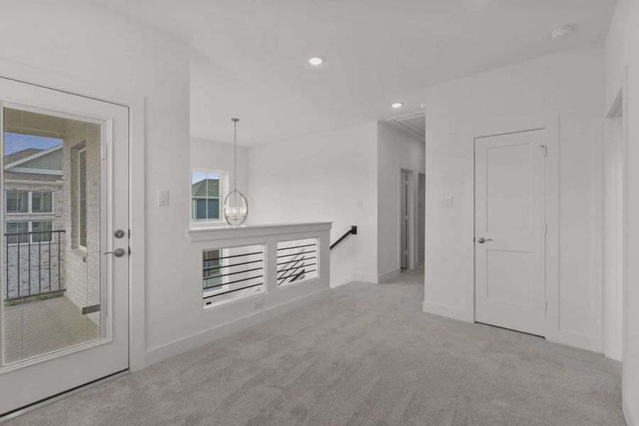 Representative unfurnished interior of a home built from the Riverdale by Chesmar Homes in Meridiana Courtyard Collection, Manvel (Image 28).