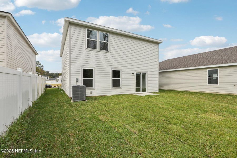 Exterior details and patio area of a home in Kings Landing, Jacksonville (Image 4). Exterior details and patio area of a home in Kings Landing, Jacksonville (Image 4).