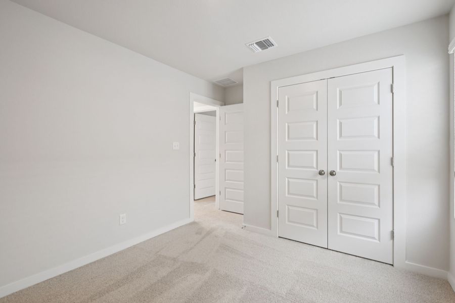 A room with white doors.