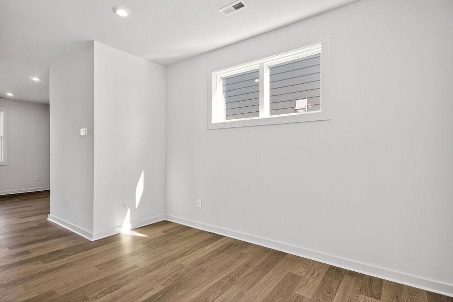 Representative unfurnished interior of a home built from the Flint B by Homes by Dickerson in Chatham Park, Pittsboro (Image 12).