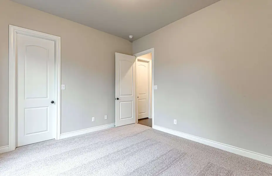 Representative unfurnished interior of a home built from the 3616 by Ravenna Homes in Artavia 70′, Conroe (Image 51).