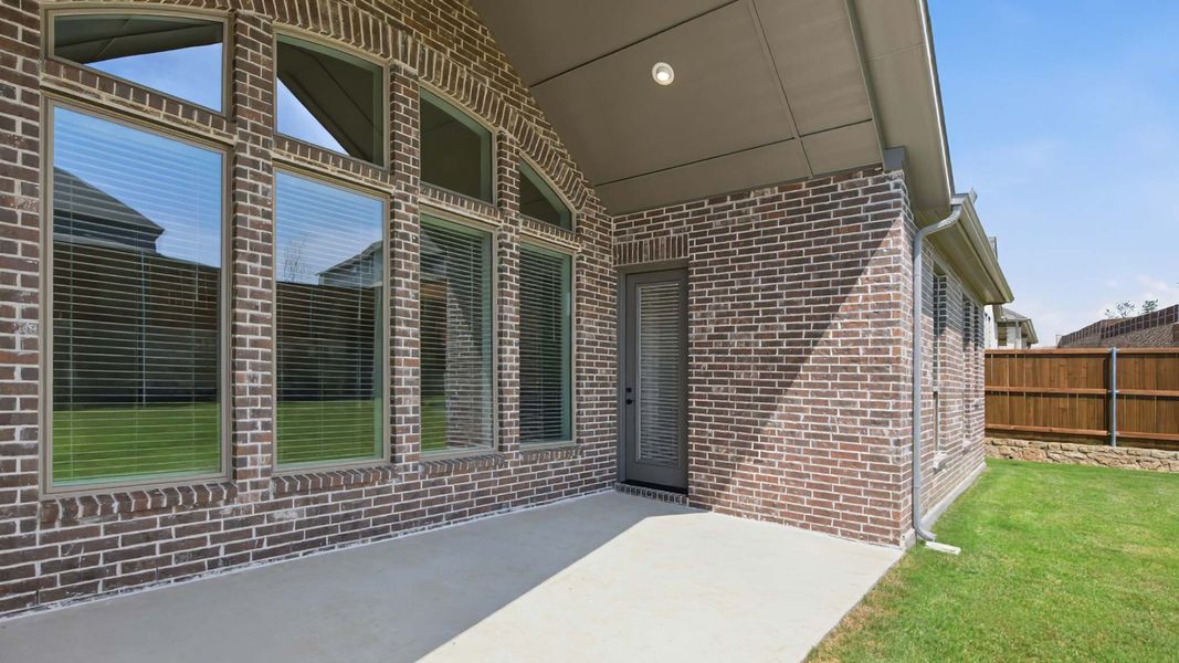 Exterior details and patio area of a home in Sweetgrass, Haslet (Image 4).