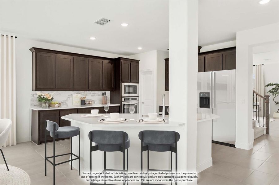Kitchen with dark wood cabinets, white island with three bar stools, marble backsplash, and stainless steel appliances Kitchen with dark wood cabinets, white island with three bar stools, marble backsplash, and stainless steel appliances