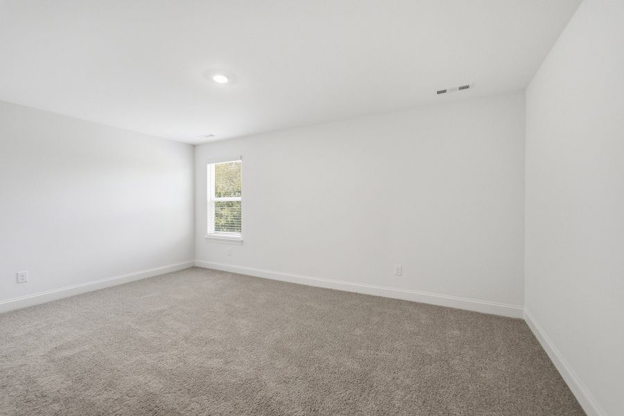 Spacious, unfurnished interior of a new home in Dorris Farm, White House (Image 54).