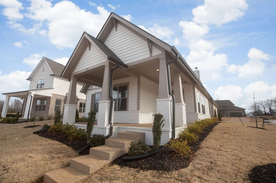 Front exterior of a new home in Twin Oaks, Oakland, TN, highlighting curb appeal (Image 29). Front exterior of a new home in Twin Oaks, Oakland, TN, highlighting curb appeal (Image 29).
