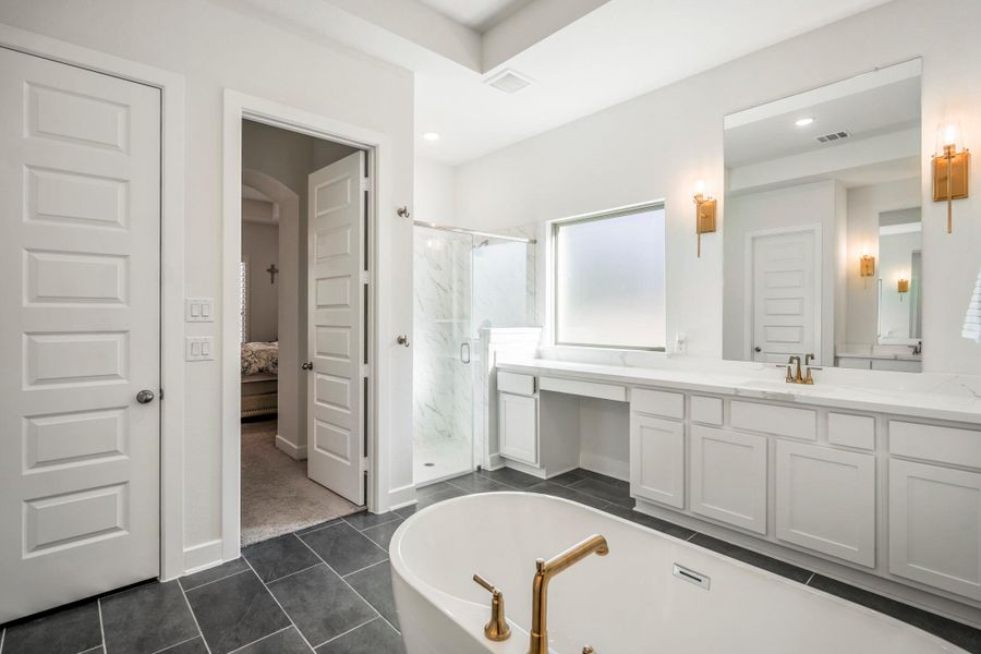 This sleek, contemporary design includes additional space to sit and abundant storage.