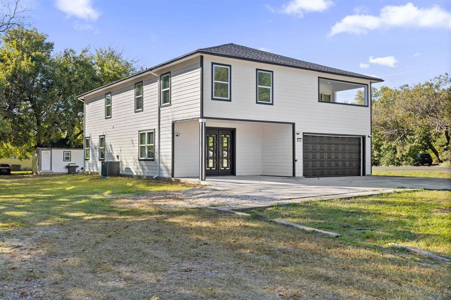 Front exterior of a new home in , Pecan Gap, TX, highlighting curb appeal (Image 26).