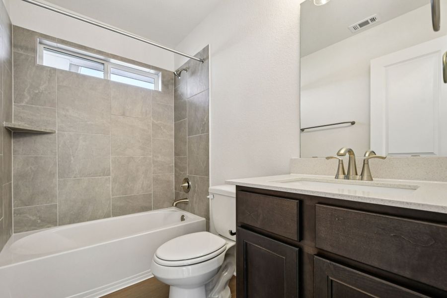 Representative furnished interior of a home built from the Andrews by Pacesetter Homes in Blanco Vista, San Marcos (Image 9).