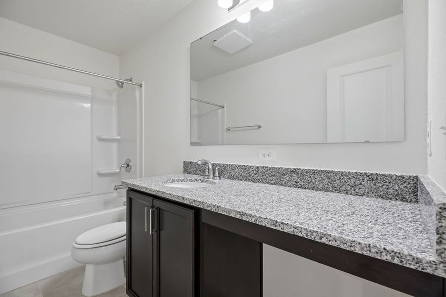 Furnished interior view inside a new home in Reserve at Forest Lake Townhomes, Lake Wales (Image 9).