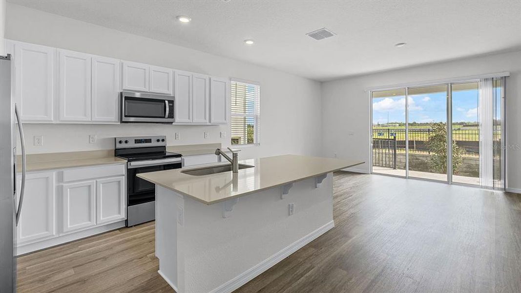 Furnished interior view inside a new home in Harmony at Lake Eloise, Winter Haven (Image 4).