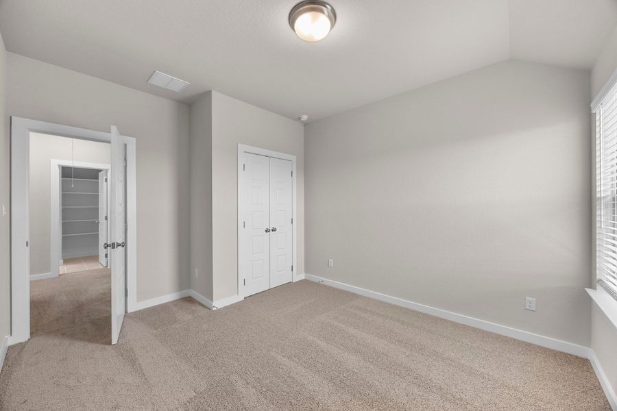 Bedroom in the Magnolia home plan by Trophy Signature Homes – REPRESENTATIVE PHOTO Bedroom in the Magnolia home plan by Trophy Signature Homes – REPRESENTATIVE PHOTO