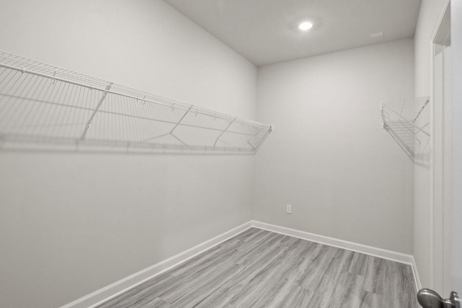 Spacious, unfurnished interior of a new home in Cypress Ridge - The Coastline Series, Longs (Image 25).