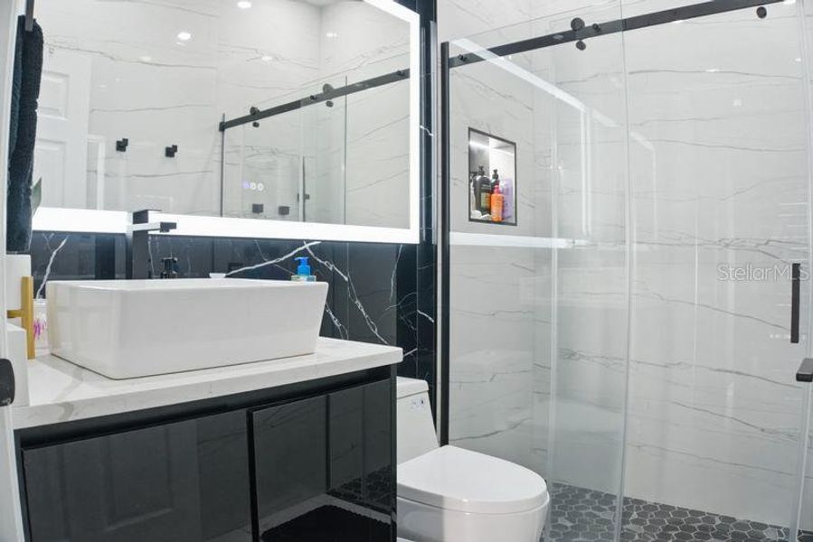 Furnished interior view inside a new home in Storey Creek, Kissimmee (Image 30).