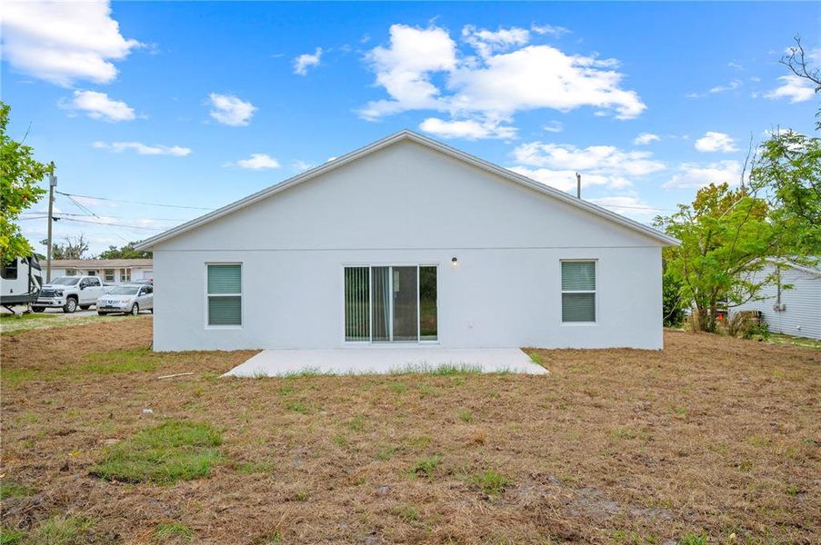Exterior details and patio area of a home in , Frostproof (Image 3). Exterior details and patio area of a home in , Frostproof (Image 3).