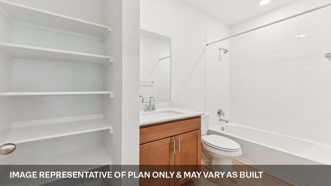 Representative furnished interior of a home built from the The Mitchell by D.R. Horton in Bar W Ranch, Leander (Image 8).