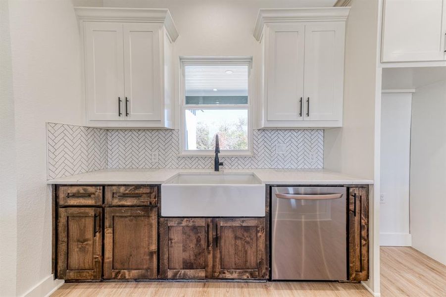 Great view of your backyard from the sink with granite counter tops