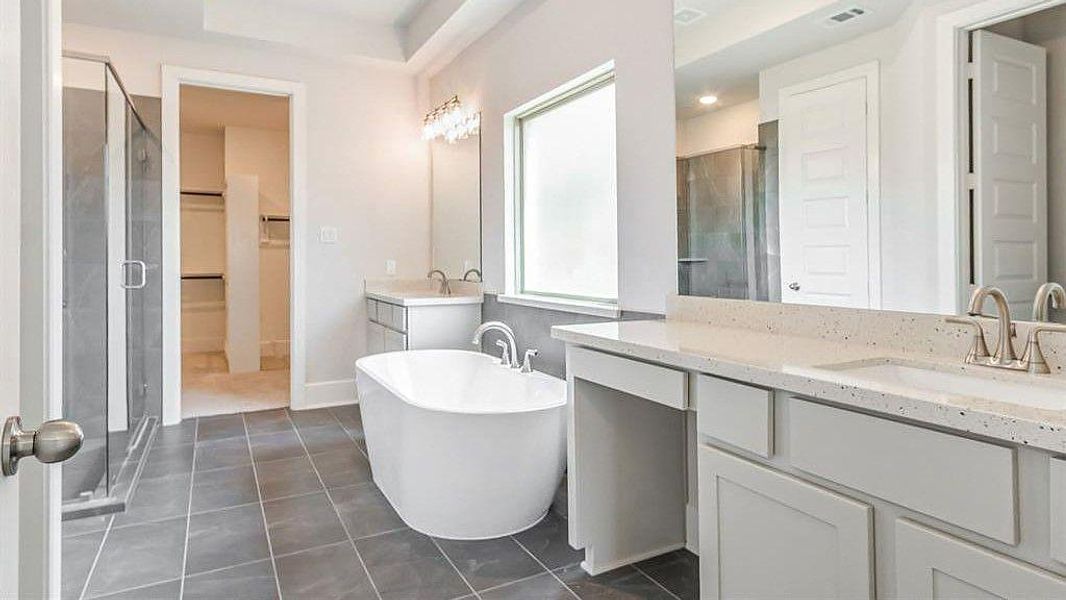 Furnished interior view inside a new home in Sunterra, Katy (Image 17).