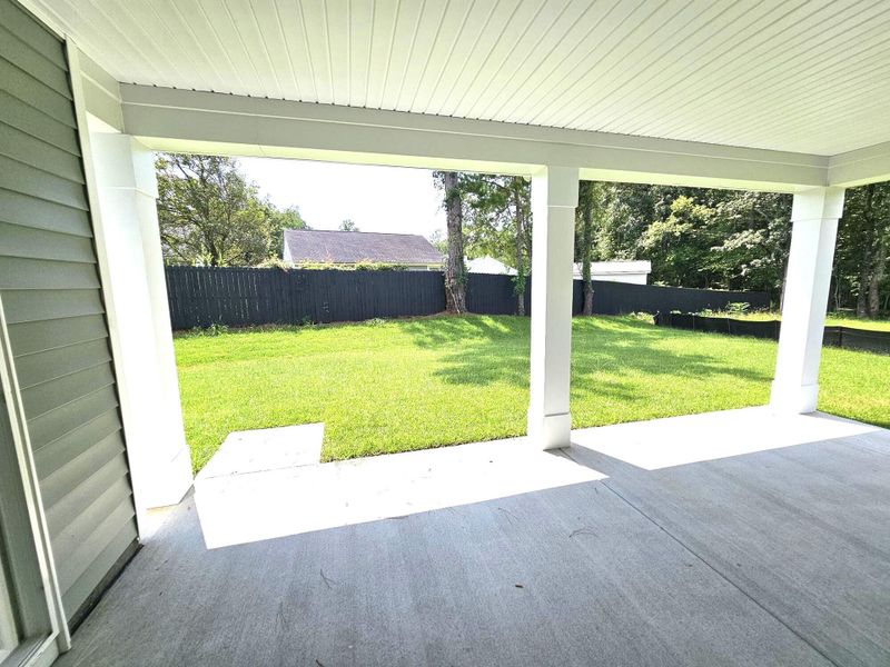 Exterior details and patio area of a home in Creekside at Andrews, Summerville (Image 3).
