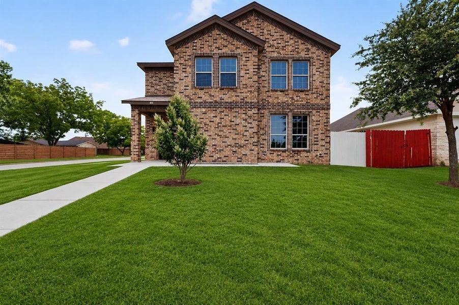 Front exterior of a new home in , Hutchins, TX, highlighting curb appeal (Image 2). Front exterior of a new home in , Hutchins, TX, highlighting curb appeal (Image 2).