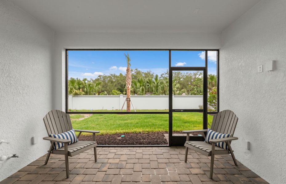 Exterior details and patio area of a home in Shores at Stillwater, Englewood (Image 20).