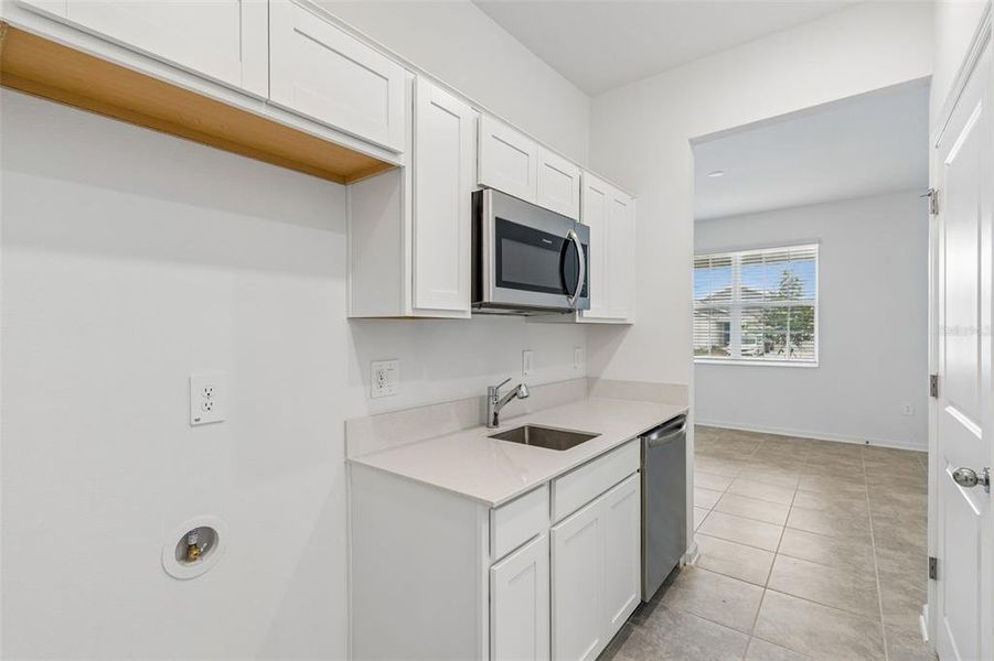 Furnished interior view inside a new home in Peace Creek Reserve, Winter Haven (Image 8).