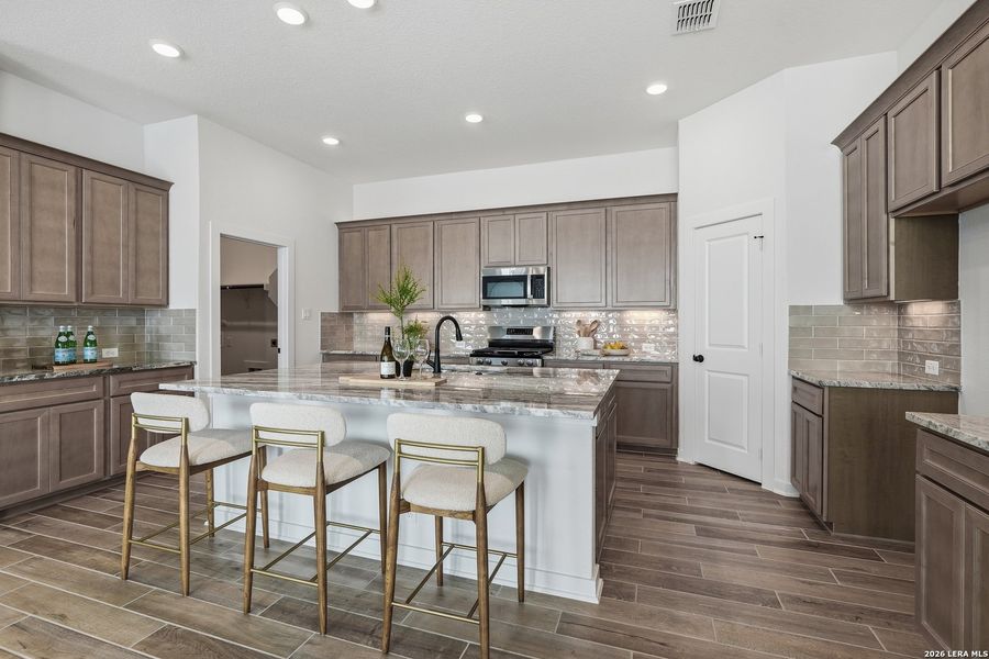 Furnished interior view inside a new home in The Crossvine, Schertz (Image 13).