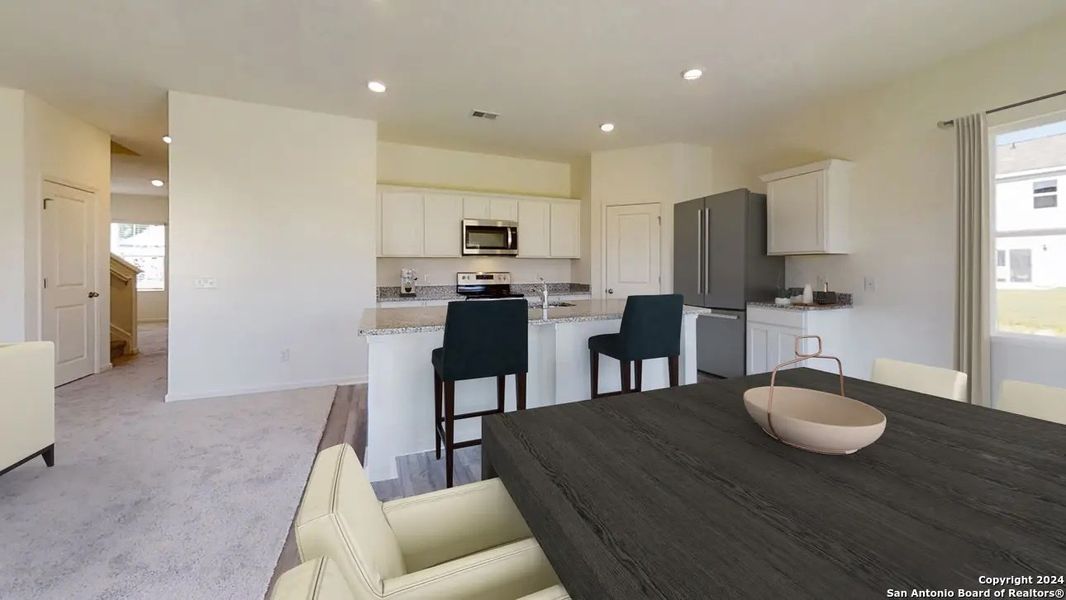 Furnished interior view inside a new home in Hennersby Hollow, San Antonio (Image 9).
