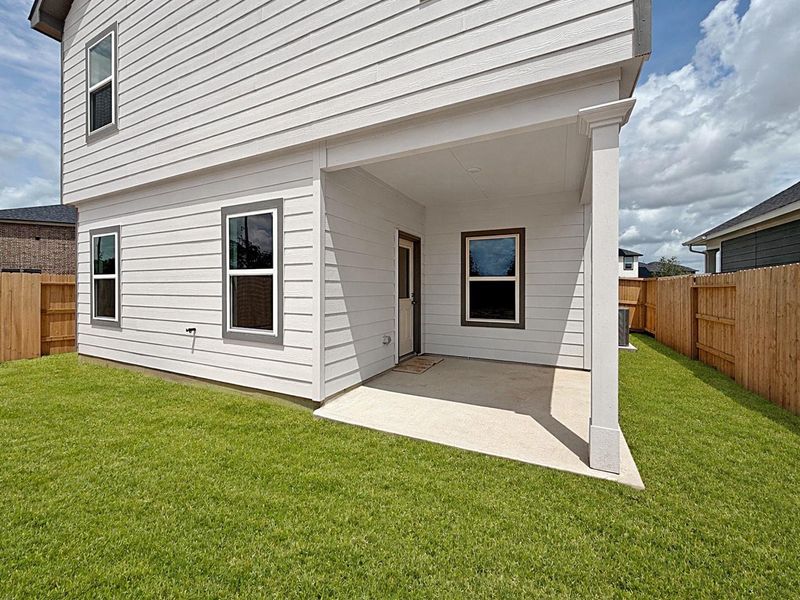 Exterior details and patio area of a home in La Segarra, Brookshire (Image 3).